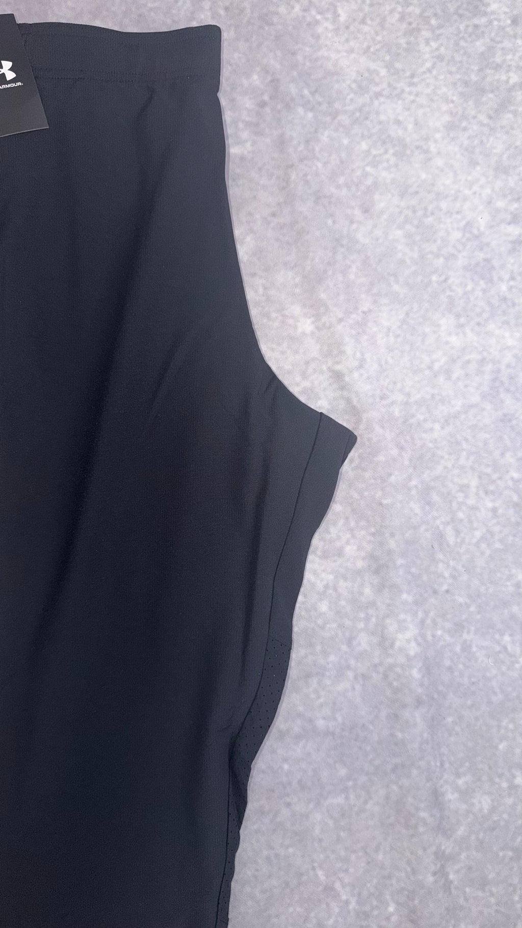 Under armour black vanish woven tapered pants.