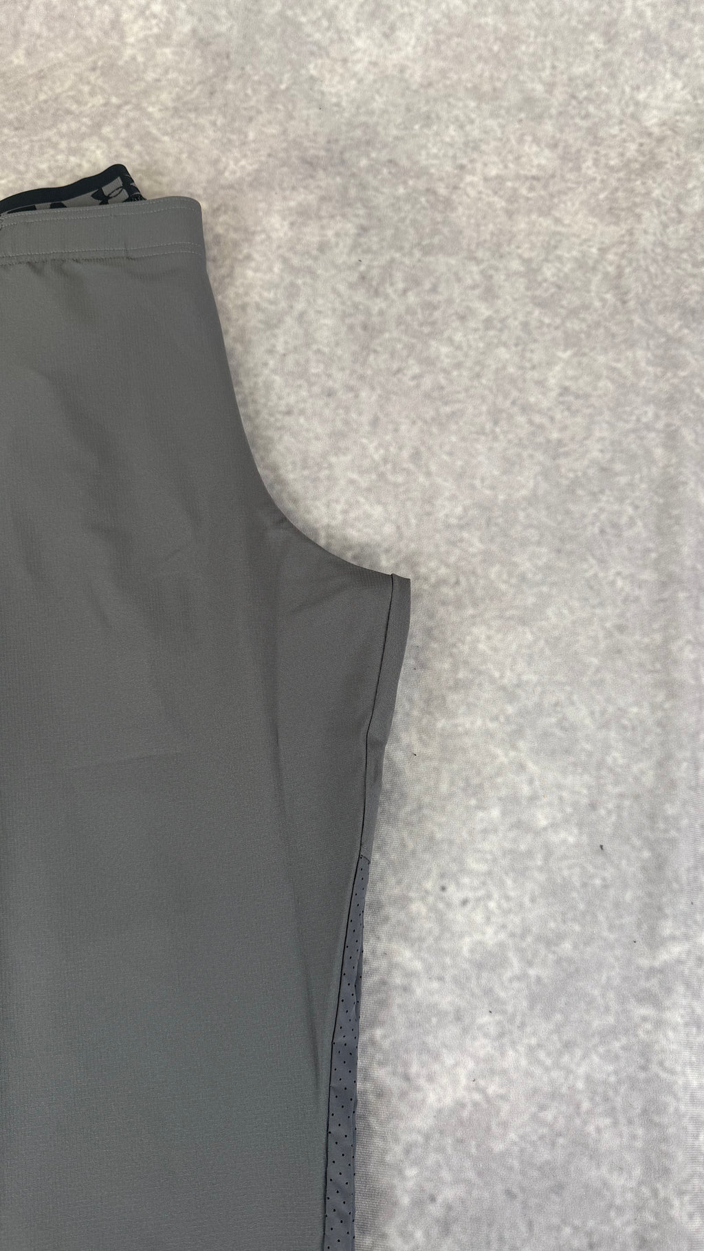 Under armour grey vanish woven tapered pants.