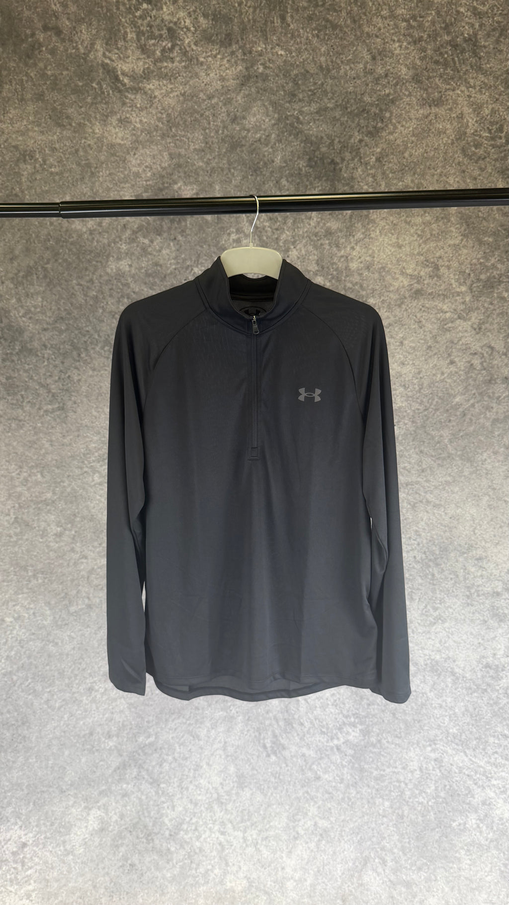 Under Armour black tech 2.0 1/2 zip.