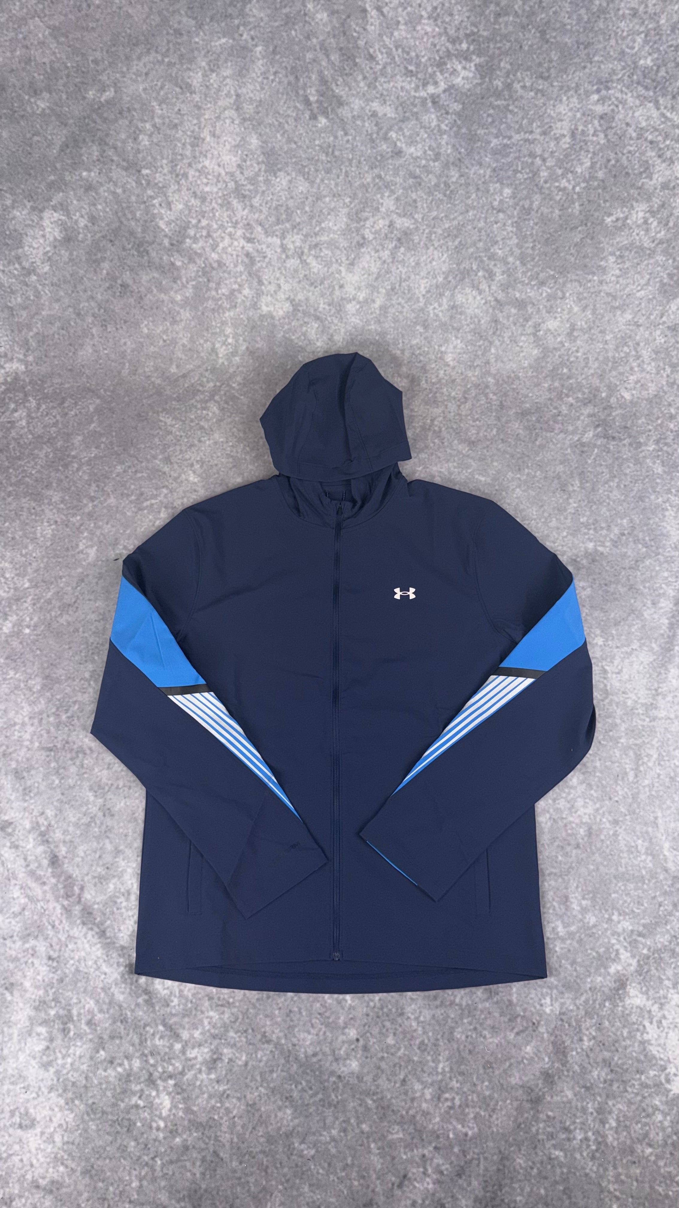 Under armour navy velociti storm hooded jacket.
