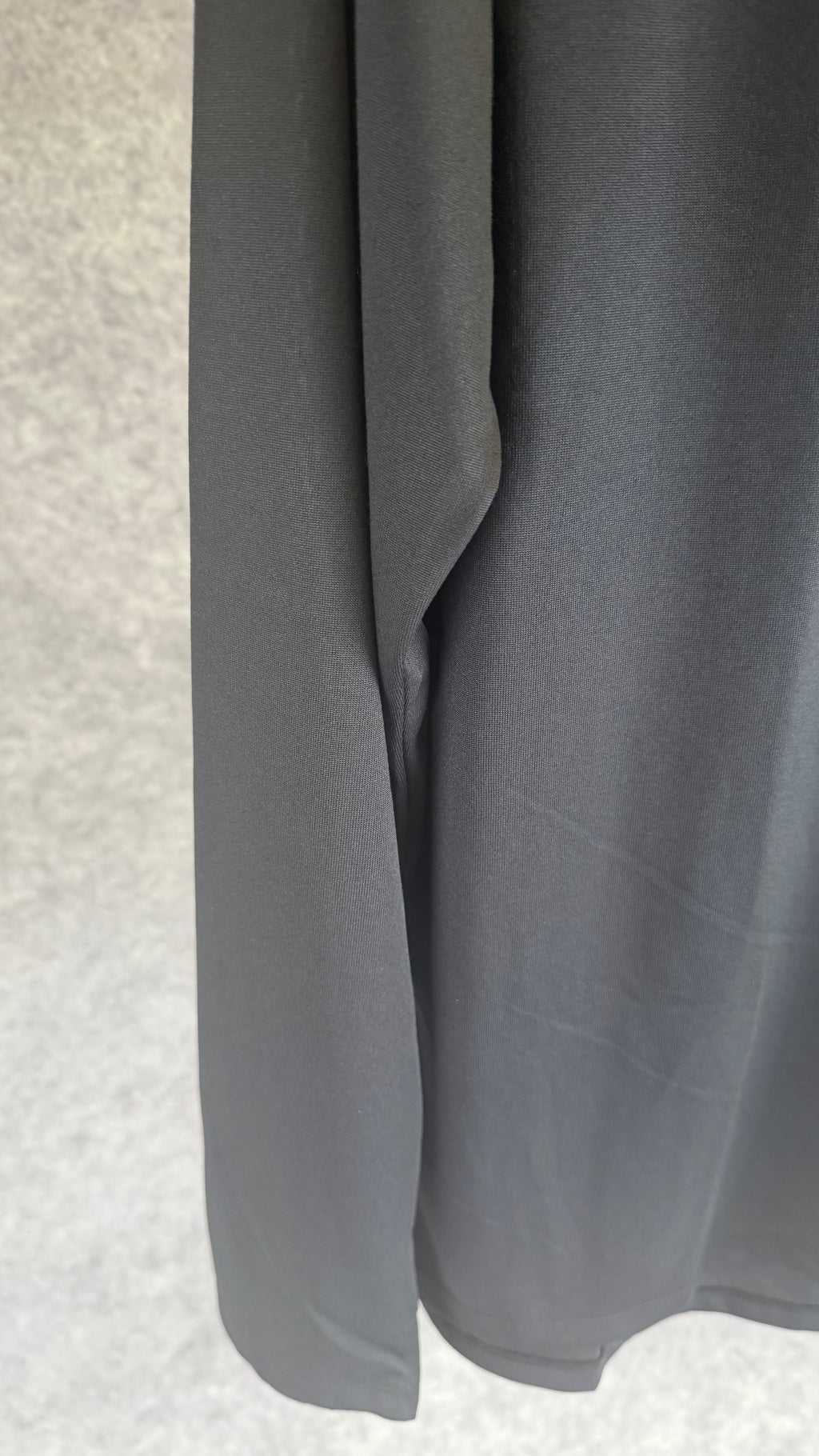 Under Armour black tech 2.0 1/2 zip.