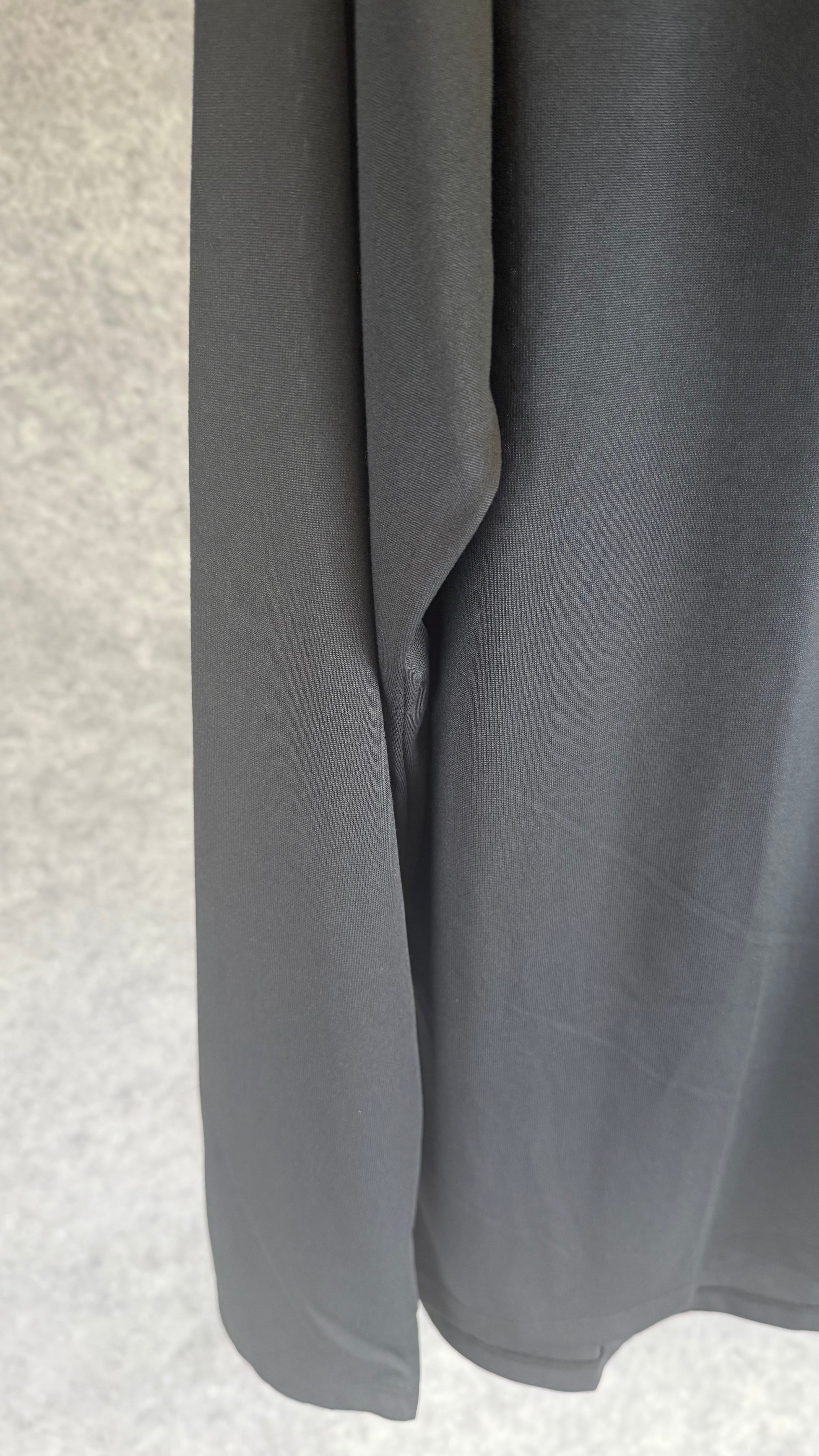 Under Armour black tech 2.0 1/2 zip.