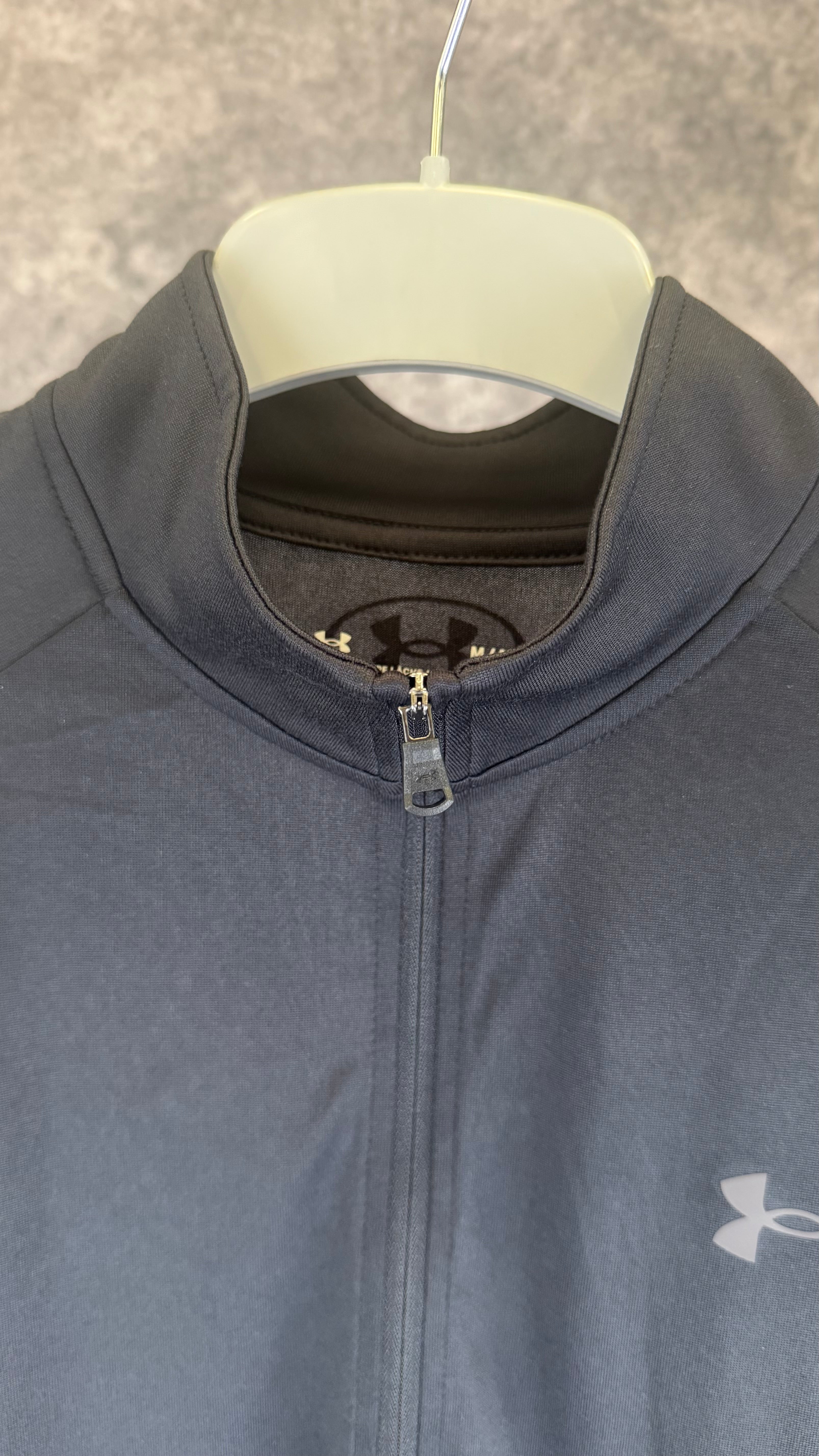 Under Armour black tech 2.0 1/2 zip.