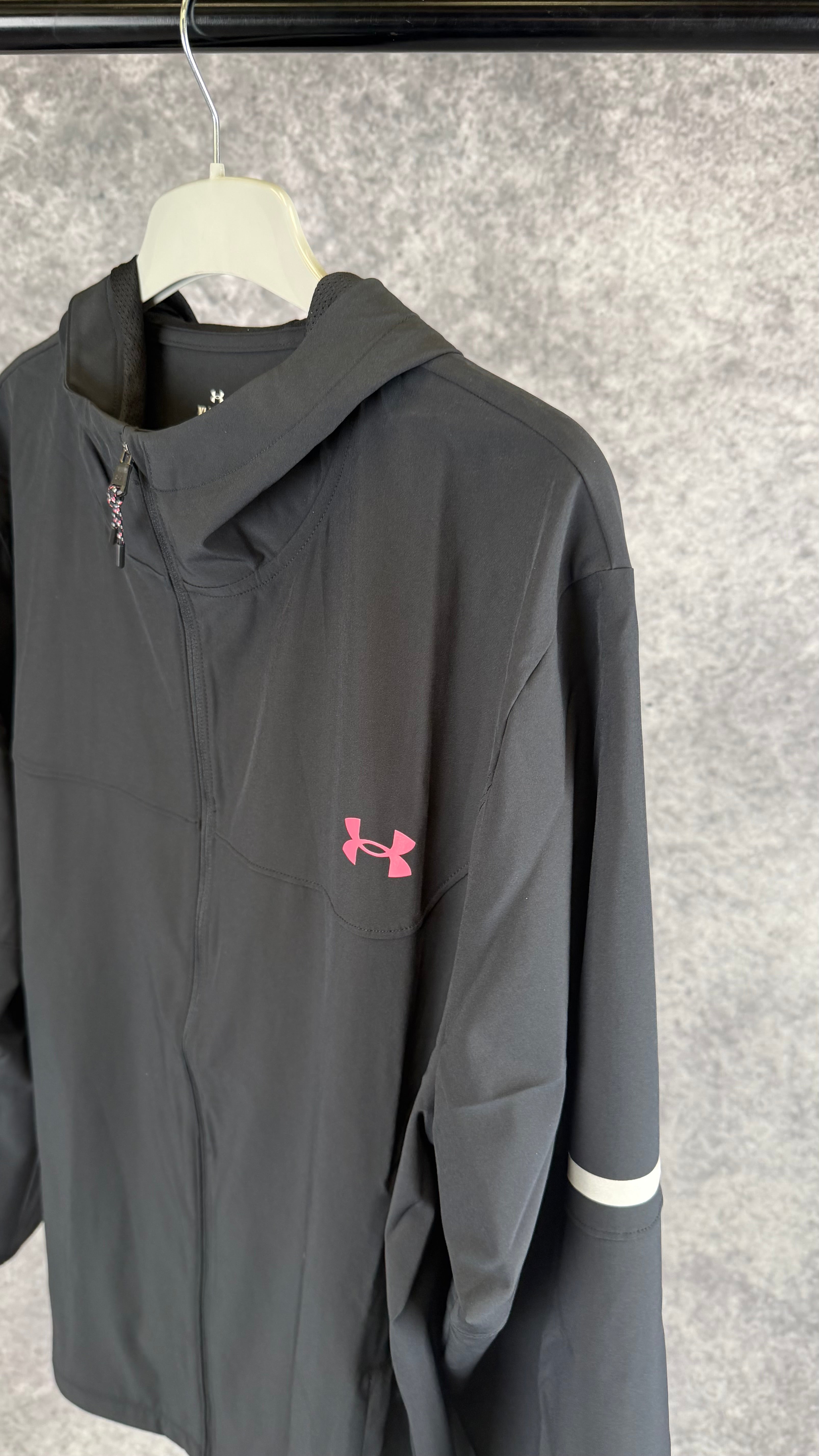 Under armour black/pink windbreaker.
