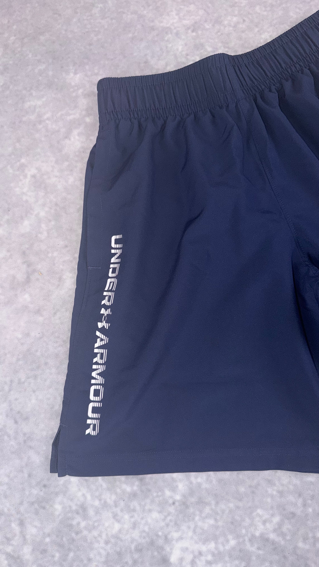 Retail £25 Under Armour tech woven word mark navy shorts.
