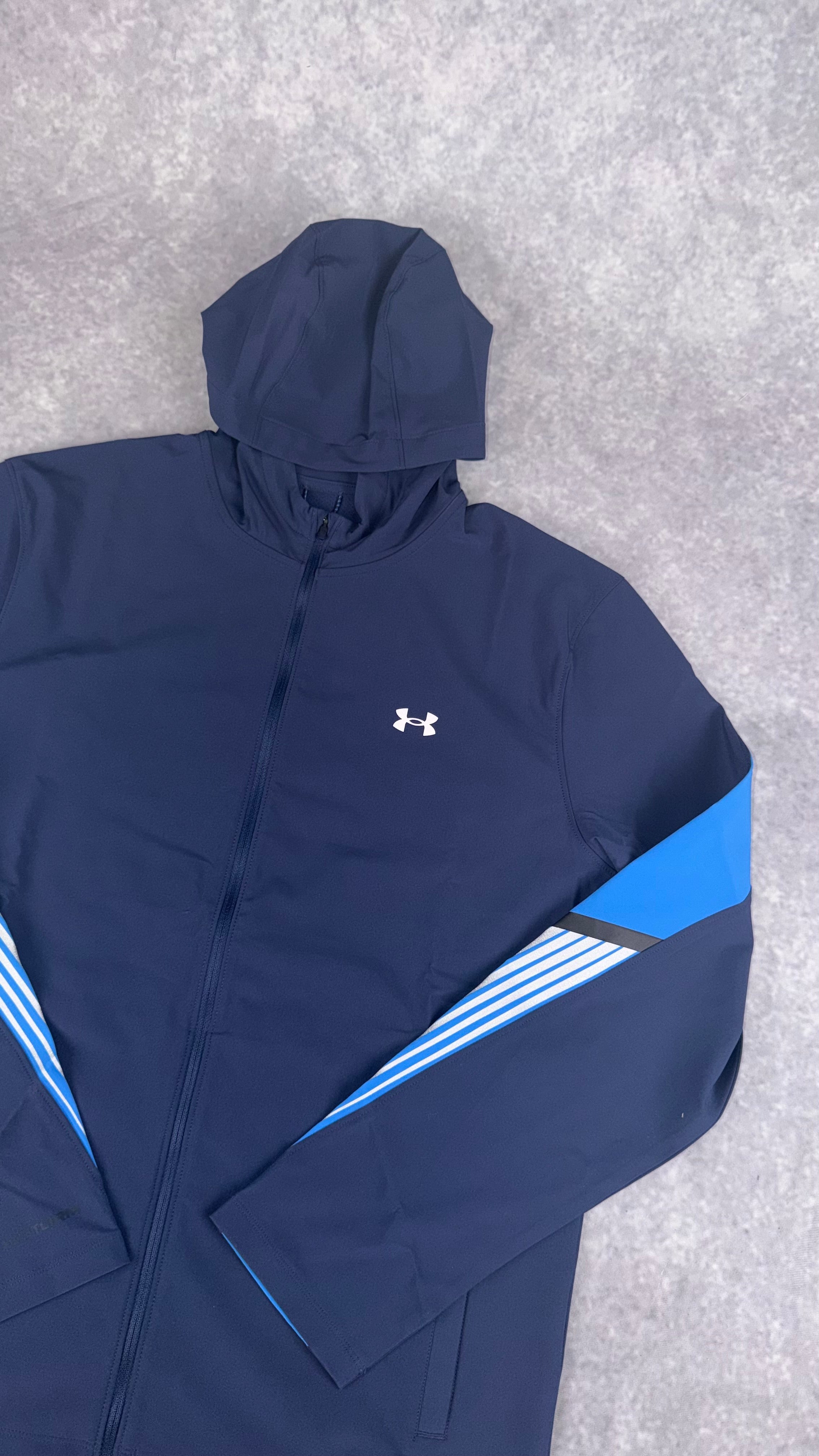 Under armour navy velociti storm hooded jacket.